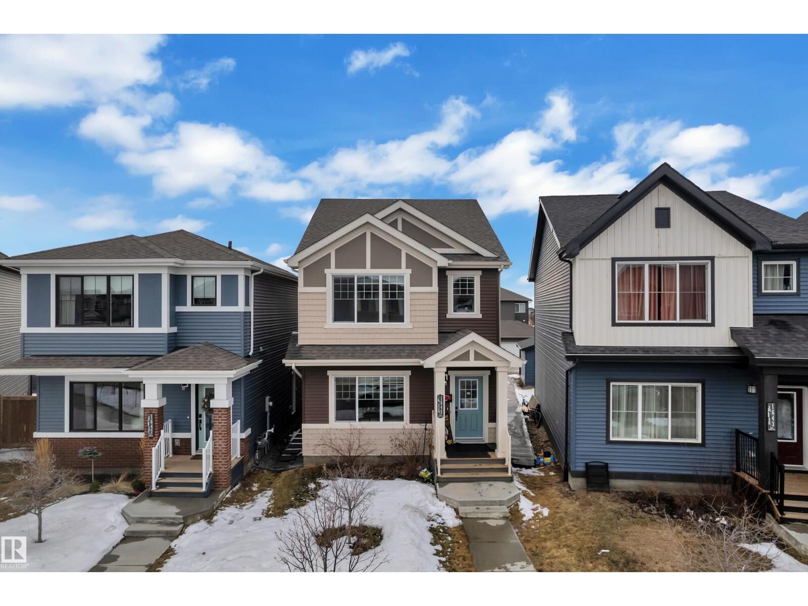 Property Photo: 1645 Plum Circle Ci SW AB T6X 2Y5