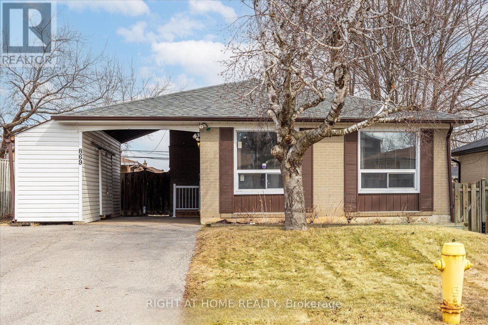 Property Photo:  869 Grenoble Boulevard  ON L1W 1T7 