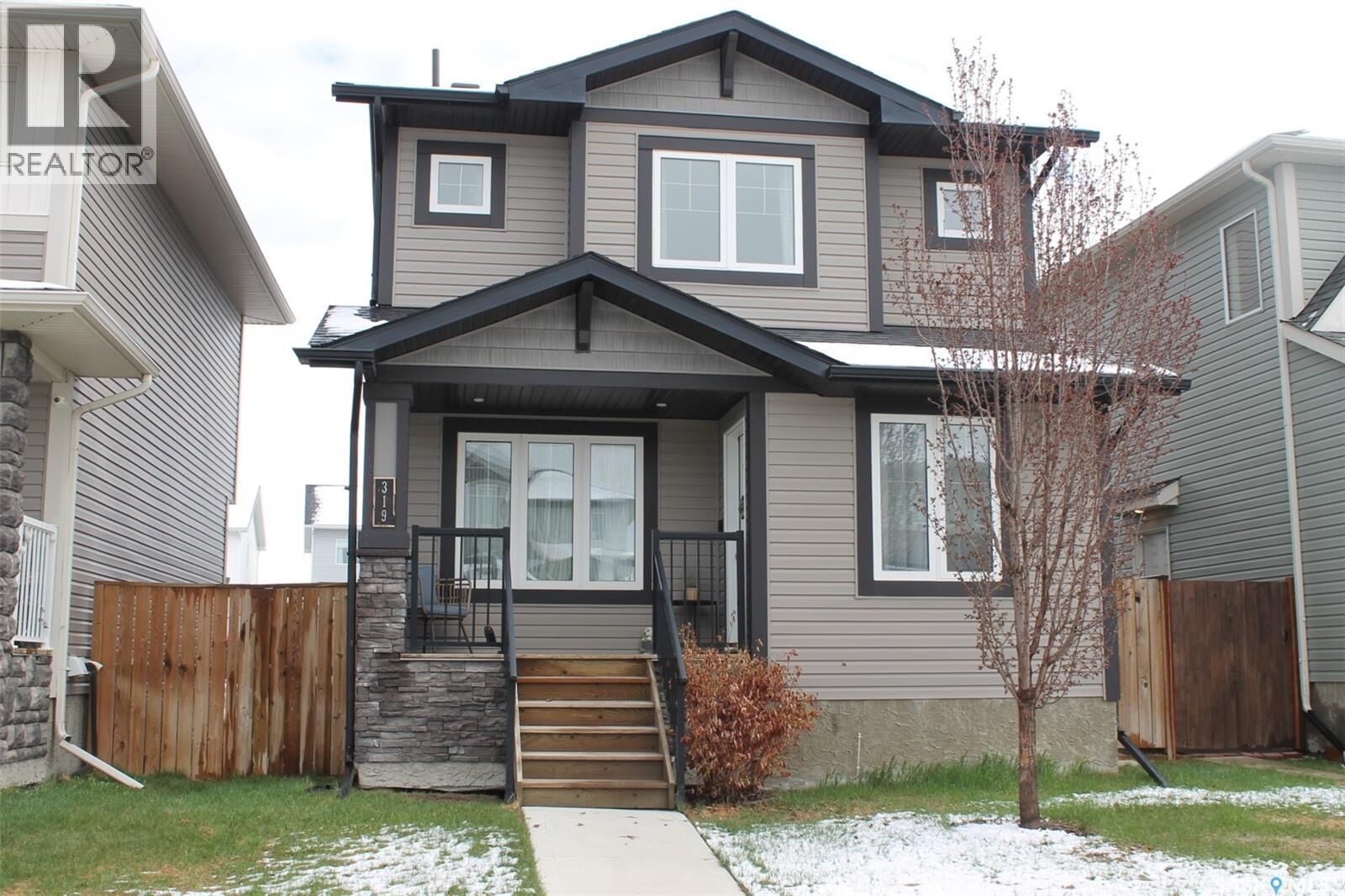 Property Photo:  319 Secord Way  SK S7V 0L9 