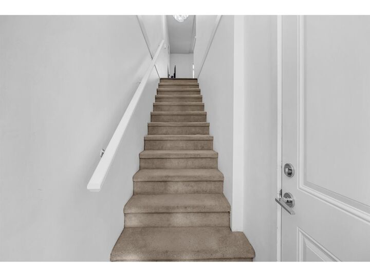 Property Photo: 8130 136A Street 130 BC V3W 1H9