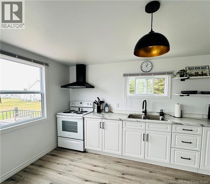 Property Photo: 25 Allee Du Repos NB E8T 1V0