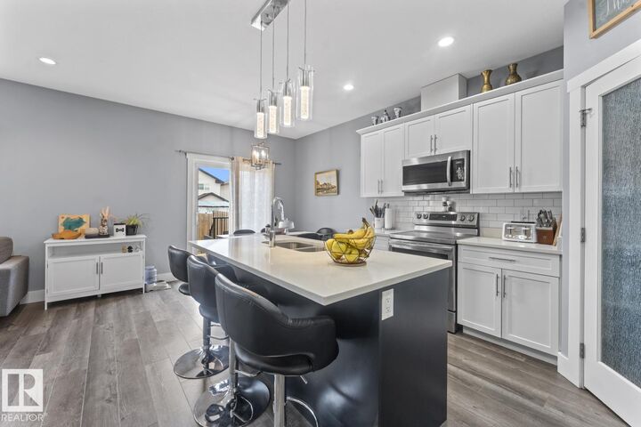 Property Photo:  6810A Tri City Way  AB T9M 0L3 
