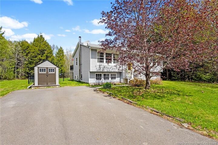 Property Photo:  22 Burton Evergreen Drive  NB E2V 3E7 