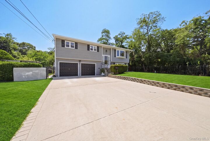 Property Photo:  58 Oakridge Drive  NY 11706 