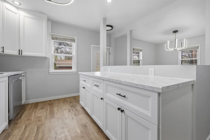 Property Photo:  1616 University Ave NW  ND 58703 