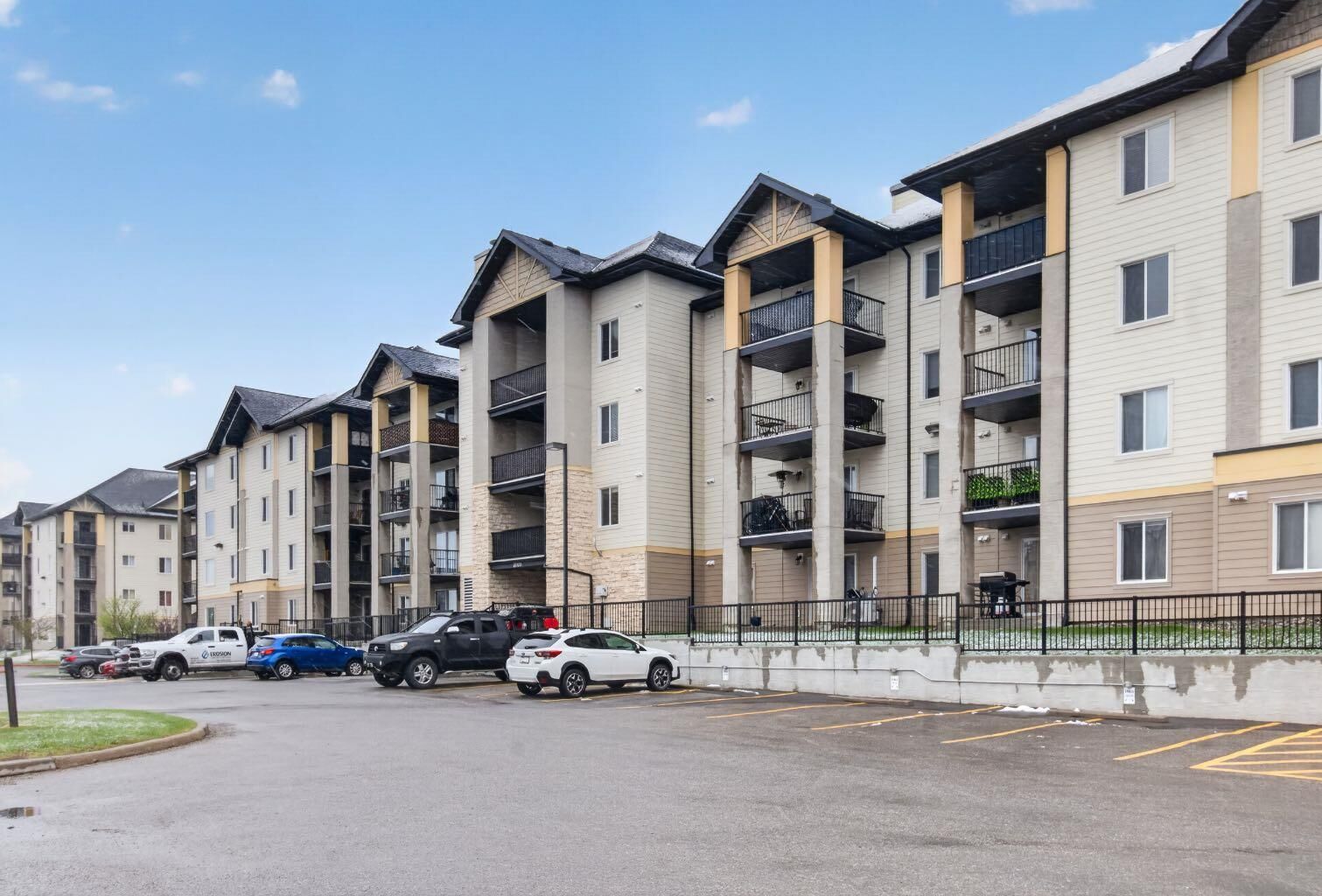 Property Photo:  304 Mackenzie Way SW 7103  AB T4B 3H7 