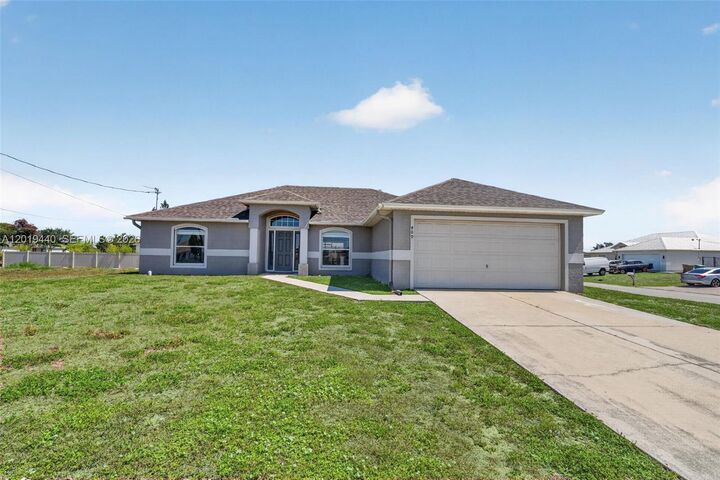 Property Photo:  409 NE 25th Ter  FL 33909 