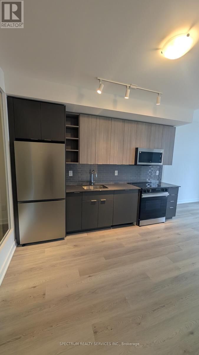 Property Photo:  2075 Lakeshore Road 407  ON L7R 1E2 