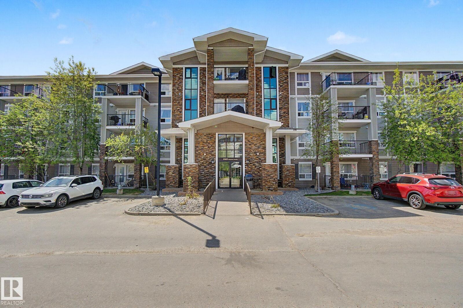 Property Photo: 9363 Simpson Drive NW 1401 AB T6R 0N2
