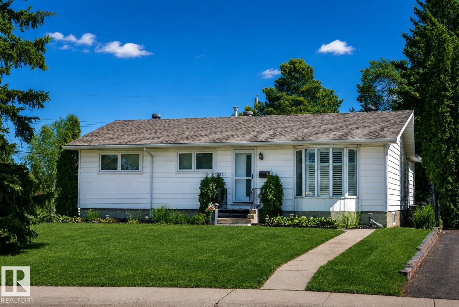 Property Photo: 10231 46 Street NW AB T6A 1X9