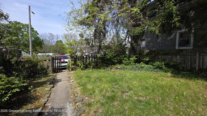 Property Photo:  219 E Mount Hope Avenue  MI 48910 