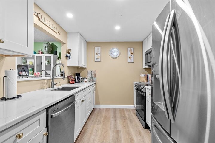 Property Photo:  1 Marc Dr. 1A11  MA 02360 