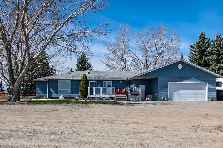 Property Photo:  32126 Coal Trail W  AB T1V 1M6 