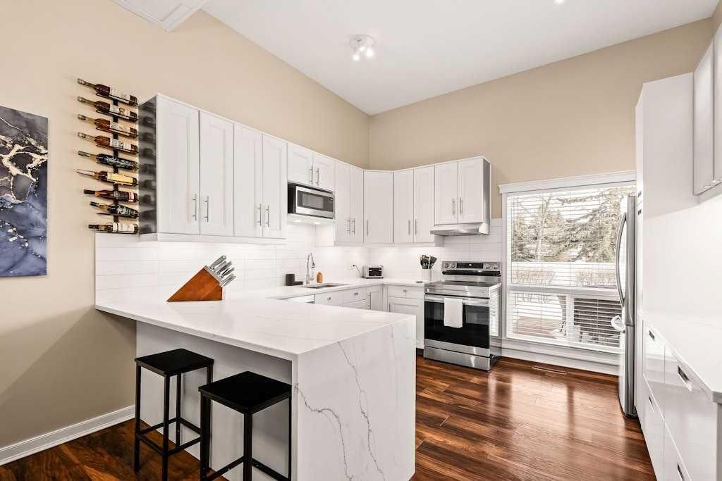 Property Photo:  99 Brae Glen Lane SW  AB T2W 1B6 
