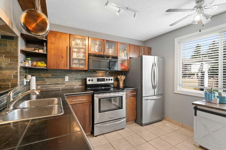 Property Photo: 530 Woodbine Boulevard SW AB T2W 5B3