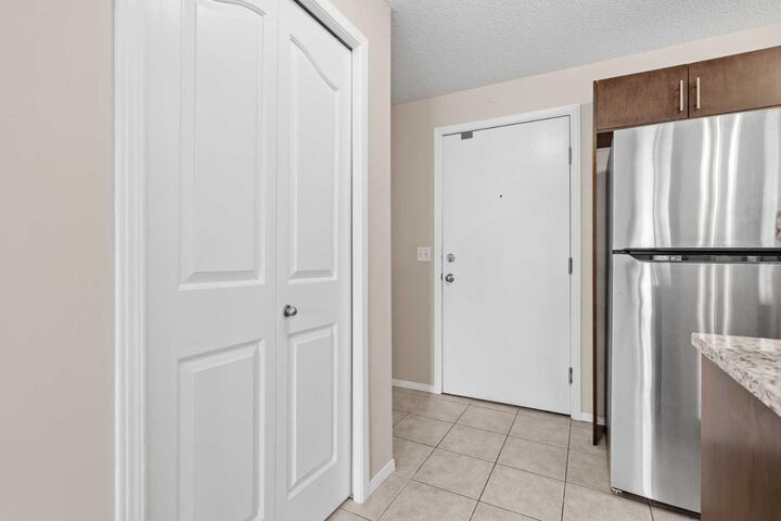 Property Photo:  8 Bridlecrest Drive SW 1203  AB T2Y 0H6 