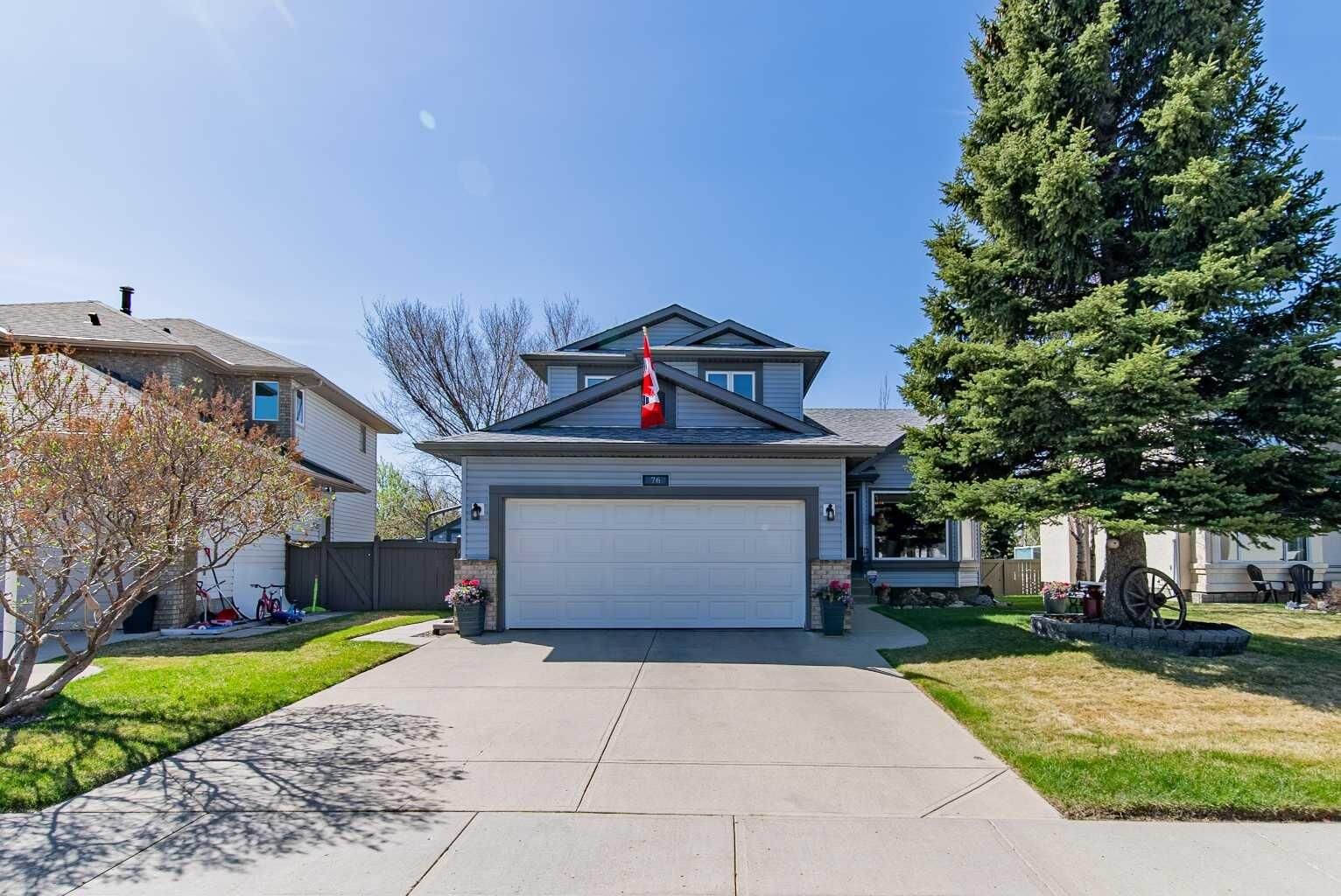 Property Photo:  76 Sunset Crescent  AB T1S 1P5 