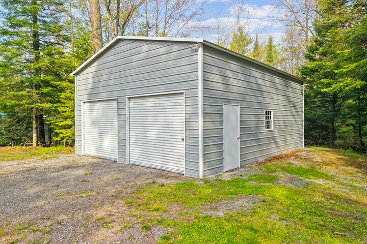 Property Photo:  19430 Carter Road  MI 49746 