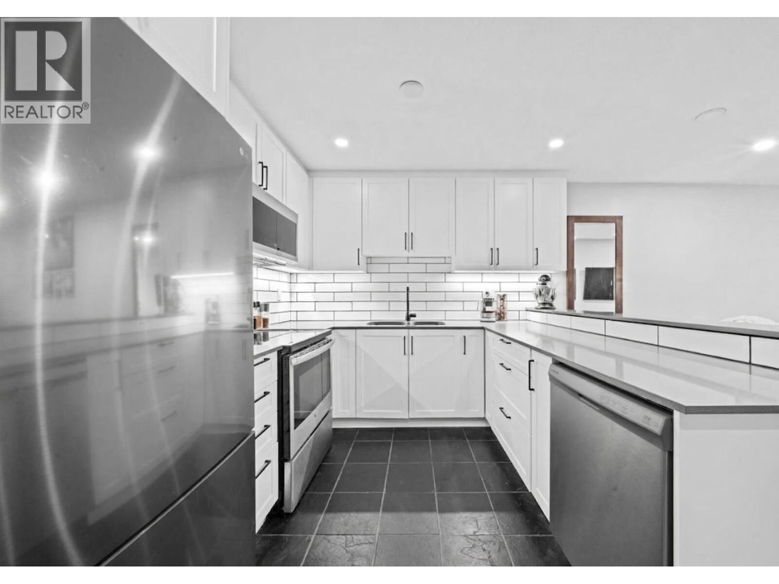 Property Photo:  1122 King Albert Avenue 101  BC V3J 1X7 