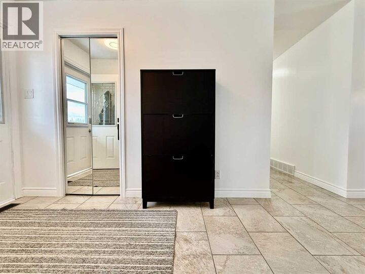 Property Photo:  402 3 Street  AB T9W 1A1 