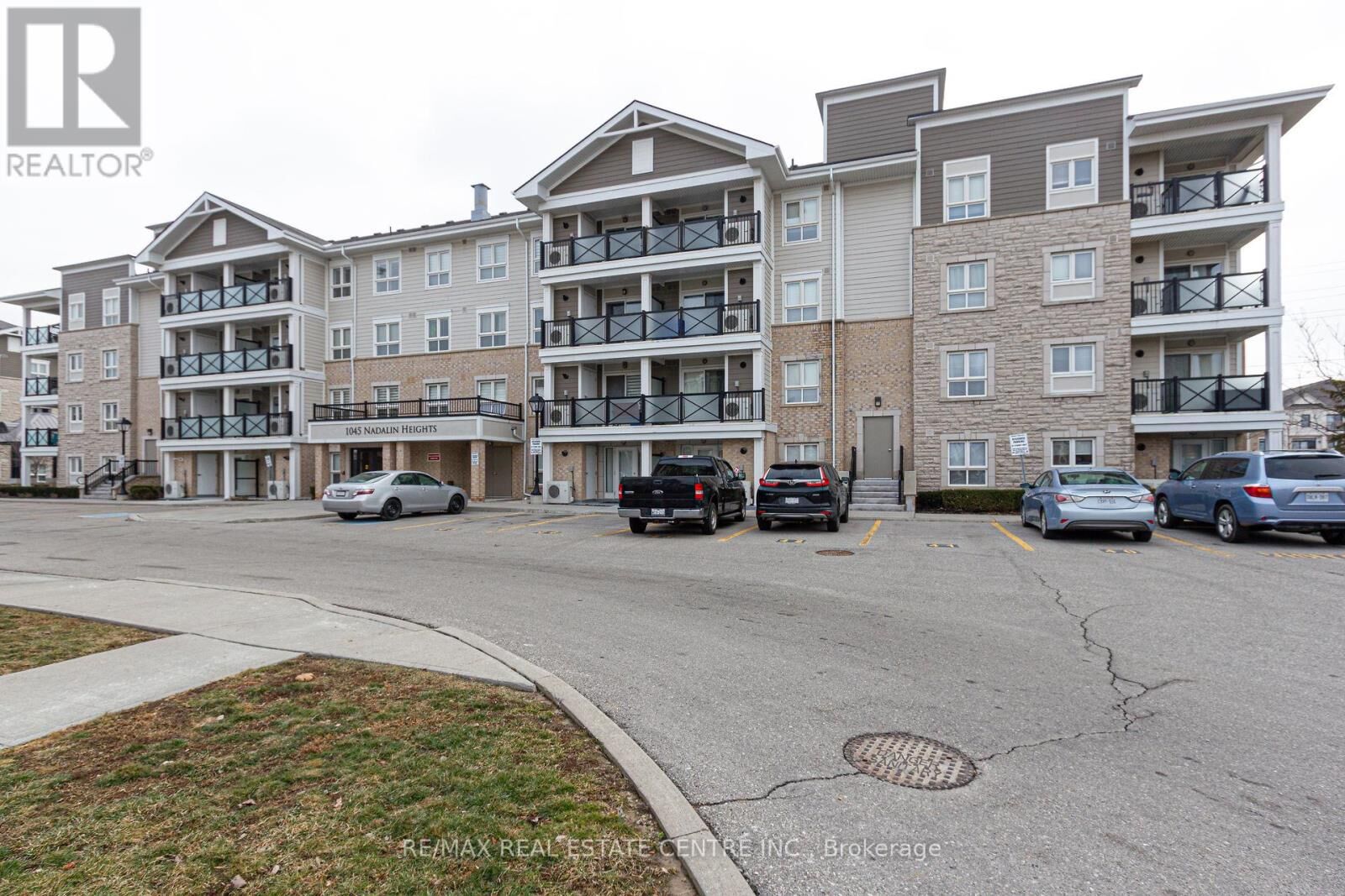 Property Photo:  1045 Nadalin Heights 211  ON L9T 8R5 