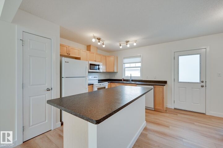 Property Photo: 6032 38 Avenue NW 38 AB T6L 0A4