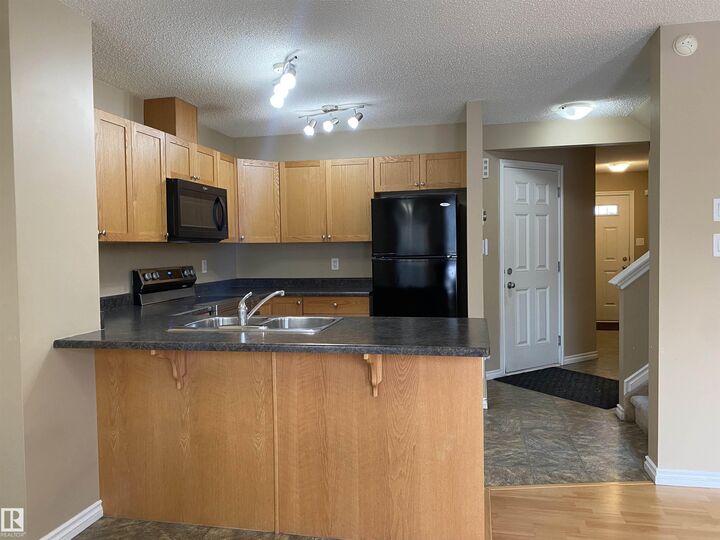 Property Photo: 6411 18 Avenue SW AB T6X 0M8