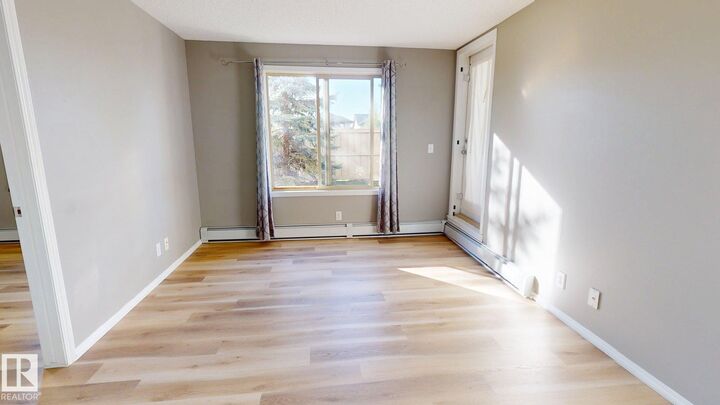 Property Photo: 11808 22 Avenue SW 116 AB T6W 2A2