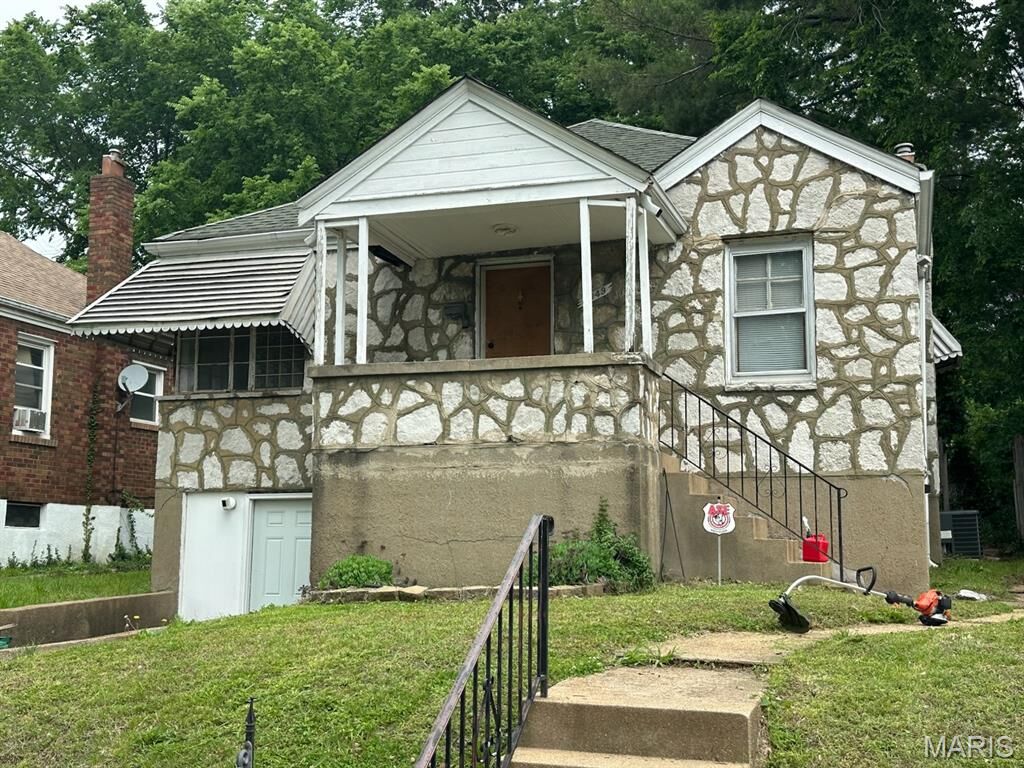 Property Photo:  6949 Claremore Drive  MO 63121 