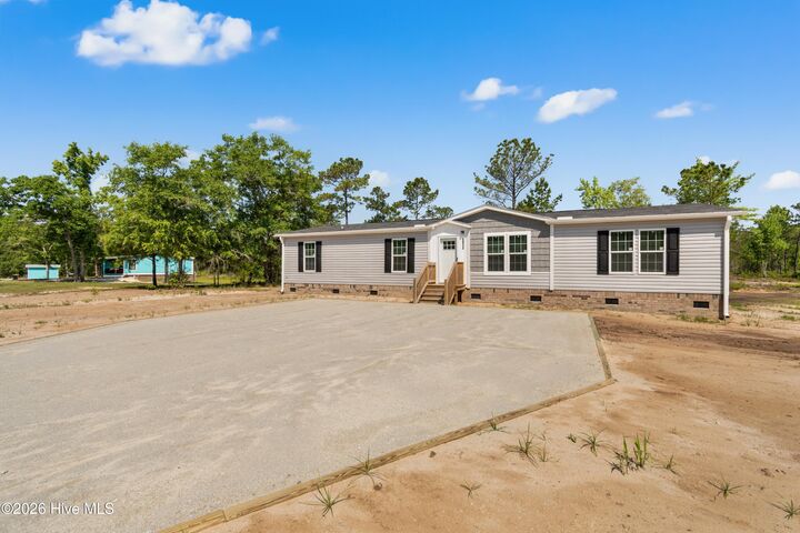 Property Photo:  6812 Lewis Drive SE  NC 28479 
