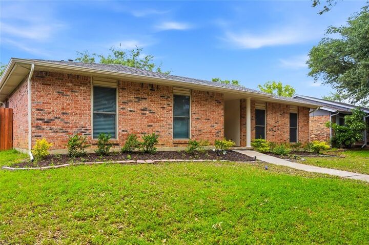 Property Photo: 1811 Addington Drive TX 75007