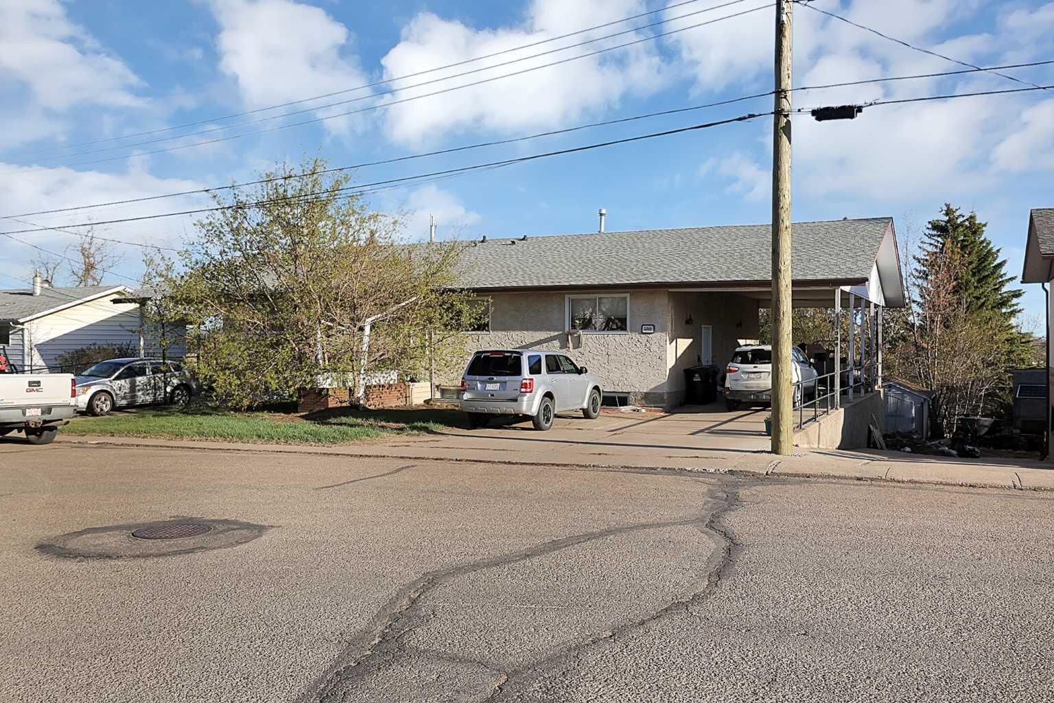 Property Photo:  5009 &Amp 5011 Shull Street  AB T0M 0J0 