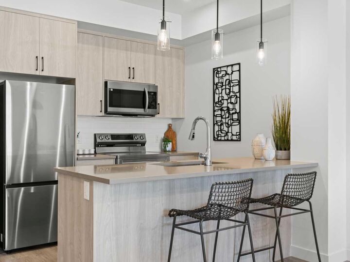 Property Photo: 2026 81 Street SW A109 AB T3H 3V9