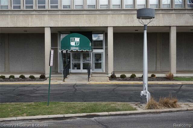 Property Photo: 22700 Garrison Street 710 MI 48124