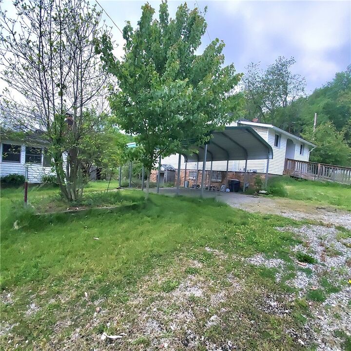 Property Photo:  203 Rock Ave  PA 15010 
