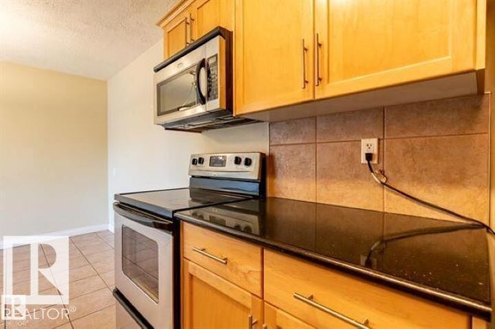Property Photo:  8215 83 Avenue NW 307  AB T6C 1A7 