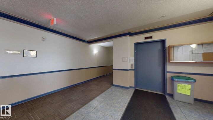 Property Photo: 16303 95 Street NW 405 AB T5Z 3V1
