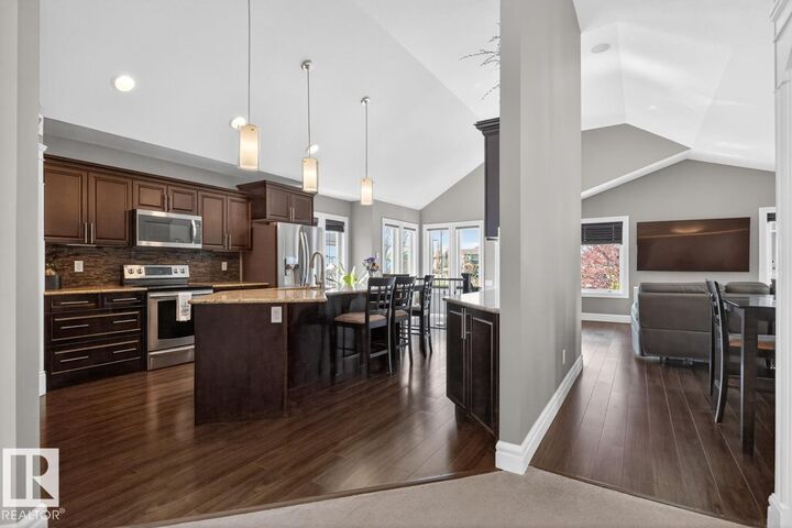 Property Photo:  301 Still Creek Crescent  AB T8H 0S7 