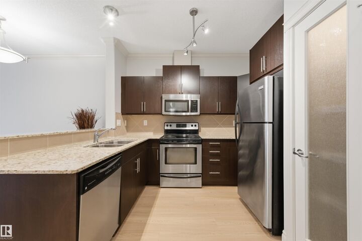 Property Photo:  10121 80 Avenue NW 235  AB T6E 0B9 