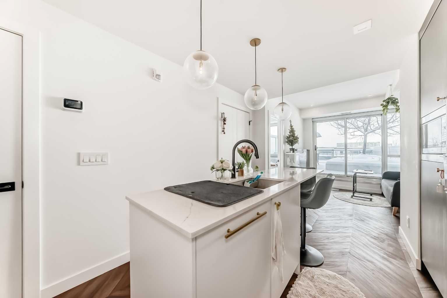 Property Photo: 8505 Broadcast Avenue SW 207 AB T3H 6B5