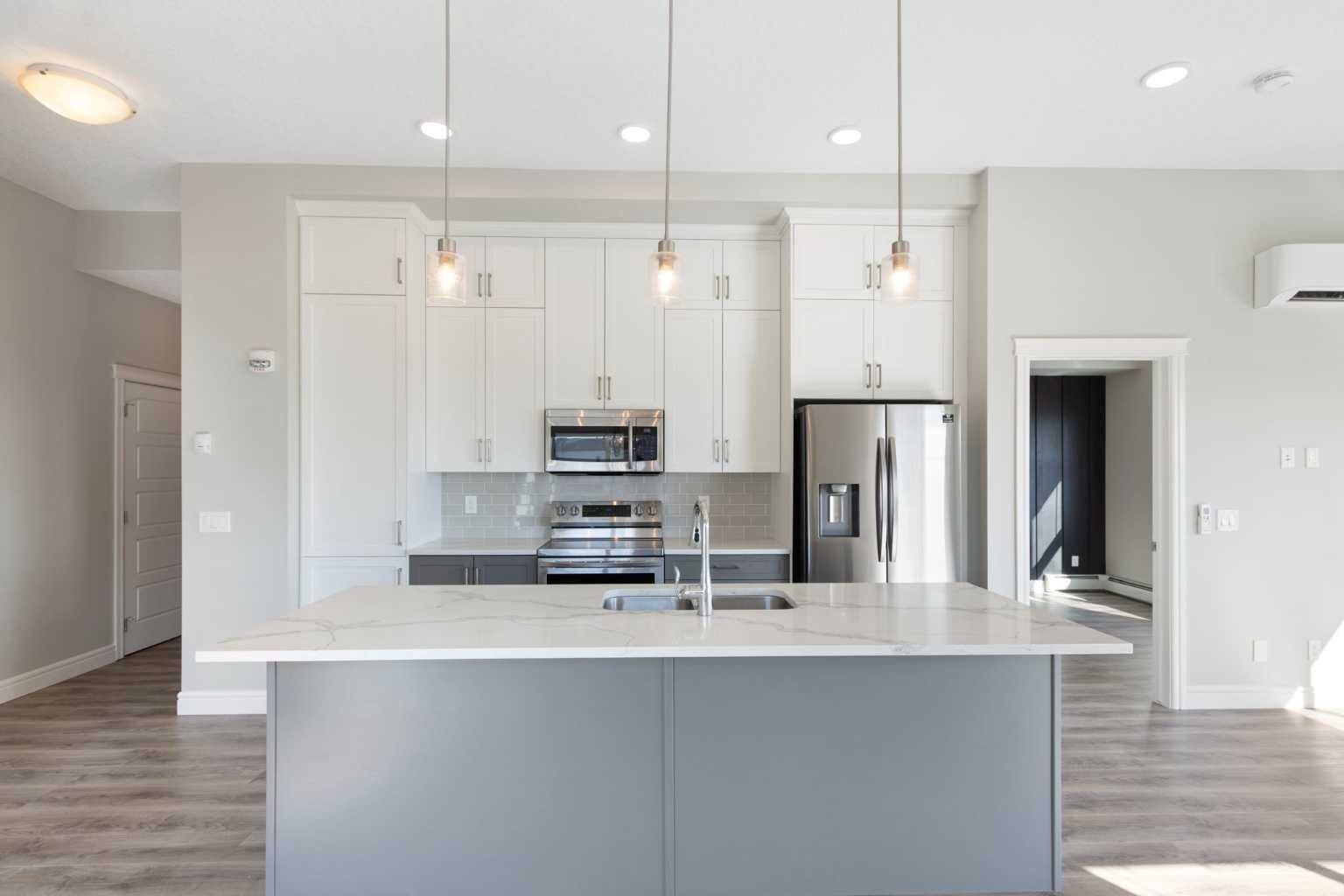 Property Photo: 19661 40 Street SE 405 AB T3M 3H3