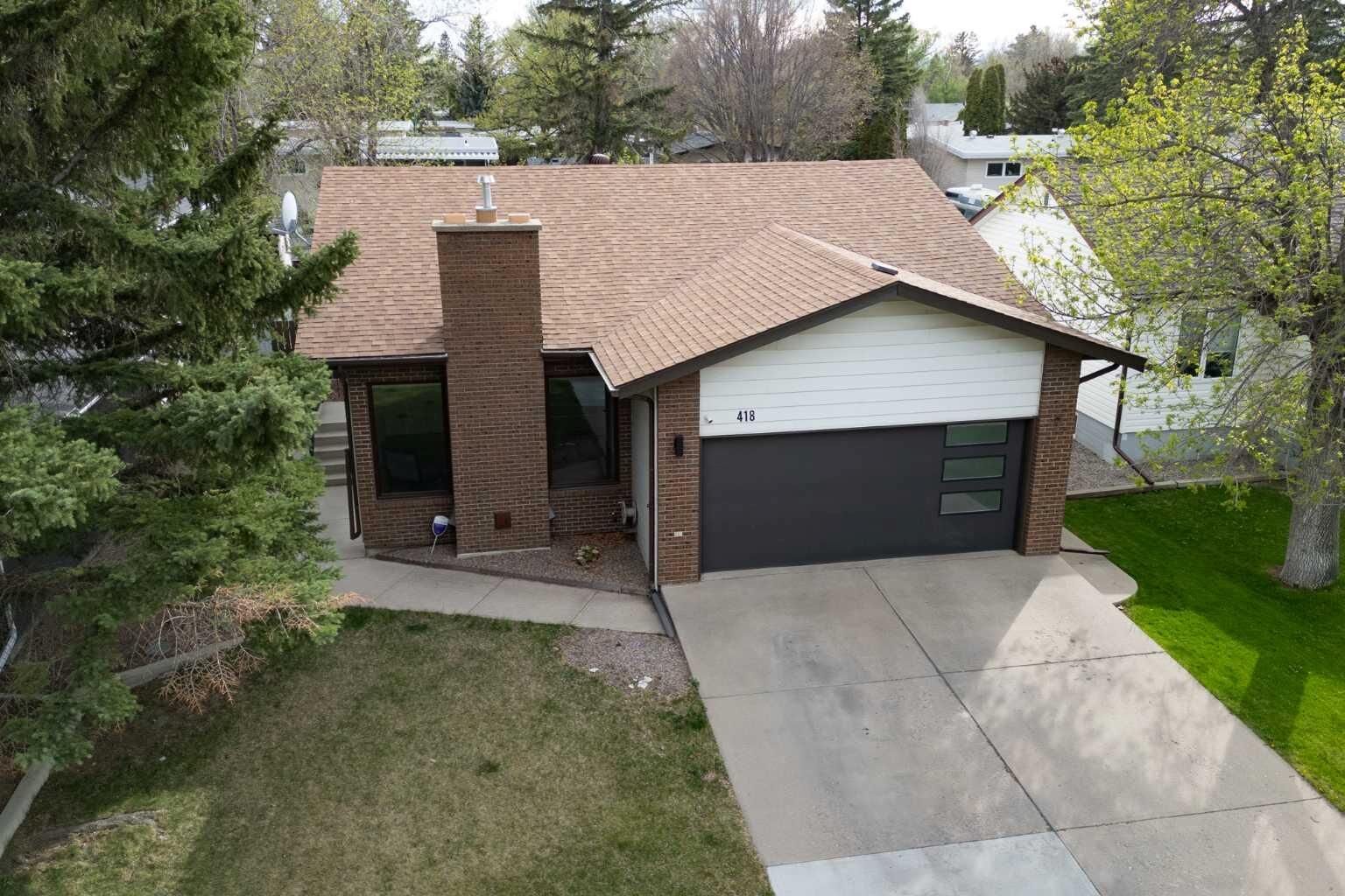 Property Photo:  418 Dieppe Boulevard S  AB T1J 3X1 
