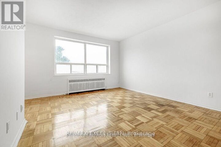 Property Photo:  156 Kingston Road 306  ON M4L 1S7 