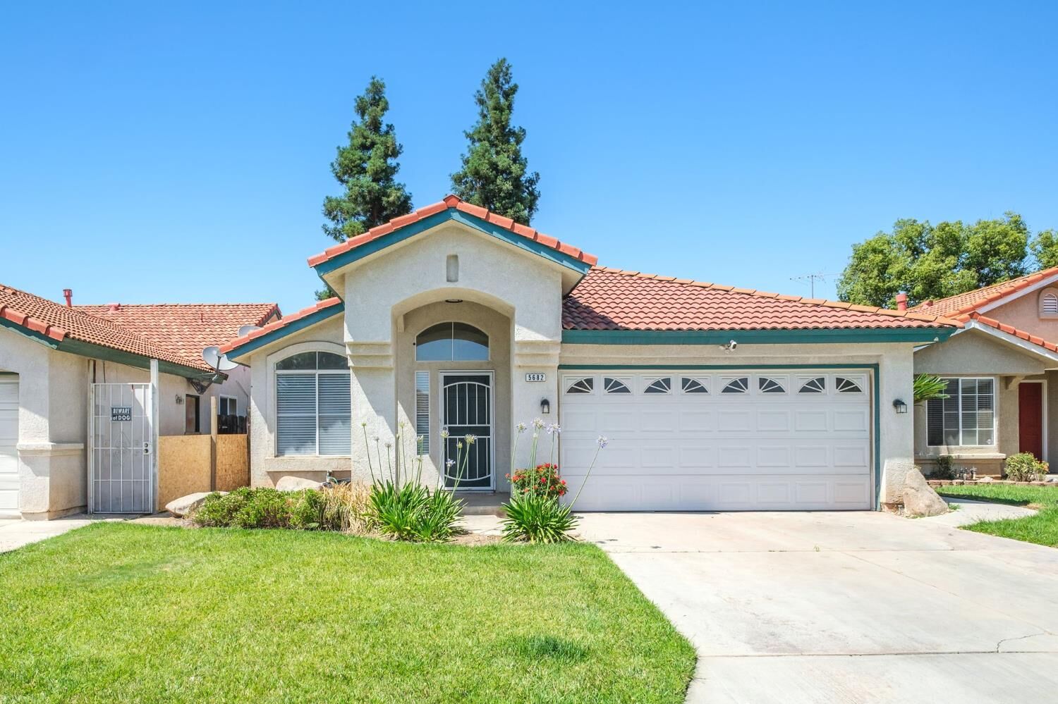Property Photo:  5682 W Sample Avenue  CA 93722 