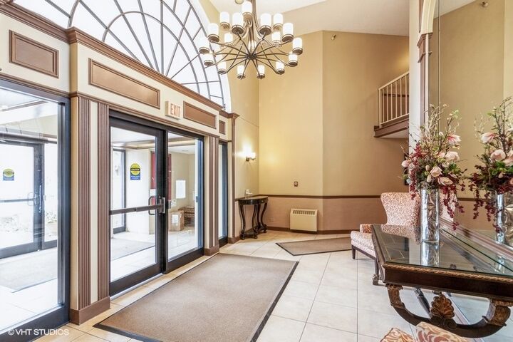 Property Photo:  509 Aurora Avenue 220  IL 60540 