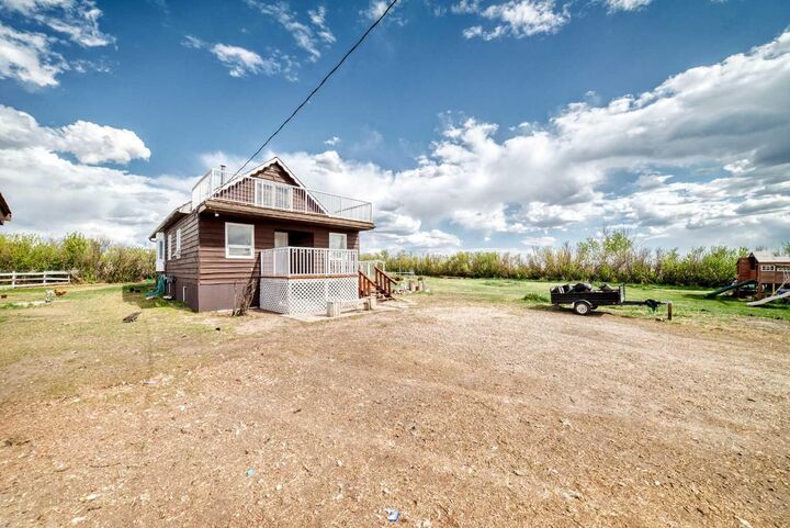 Property Photo: 225079 Range Road 245 AB T1P 0N5