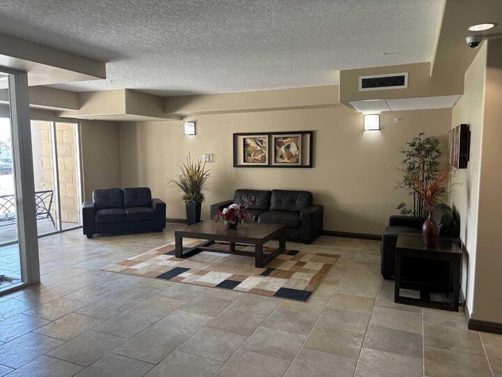 Property Photo: 4102 69 Avenue 323 AB T9V 7K5
