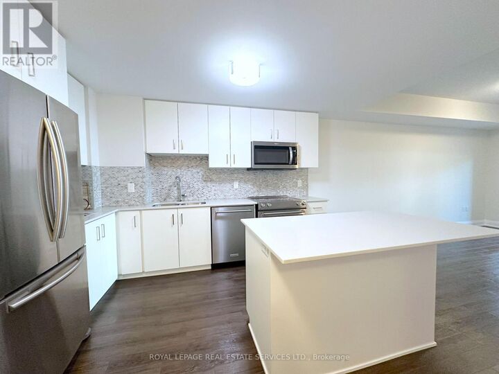 Property Photo: 2333 Taunton Road 101 ON L6H 0N5