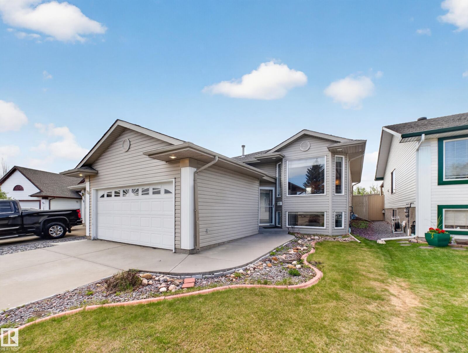 Property Photo:  108 Ridgepoint Way  AB T8A 6B3 
