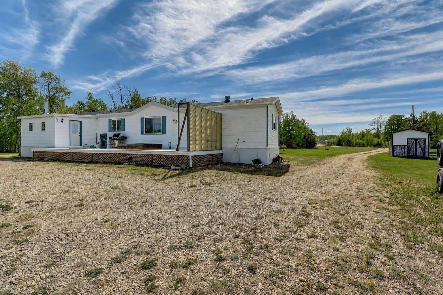 Property Photo:  743001 Range Road 51  AB T0H 3C0 